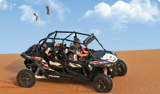 family enjoy dune byggy desert tour