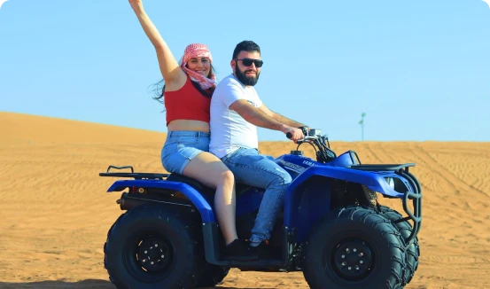 Couple quad biking